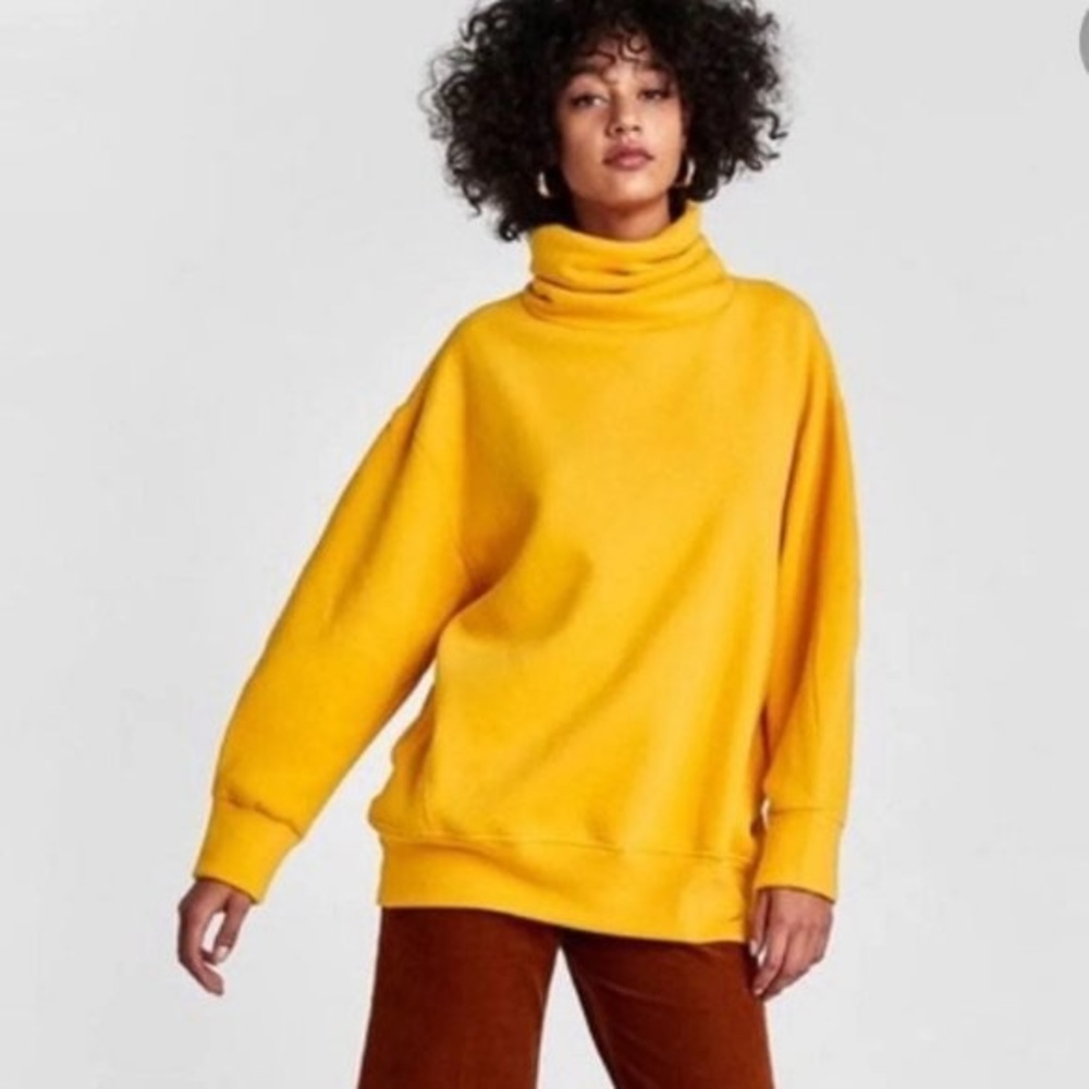 Yellow turtleneck sweater